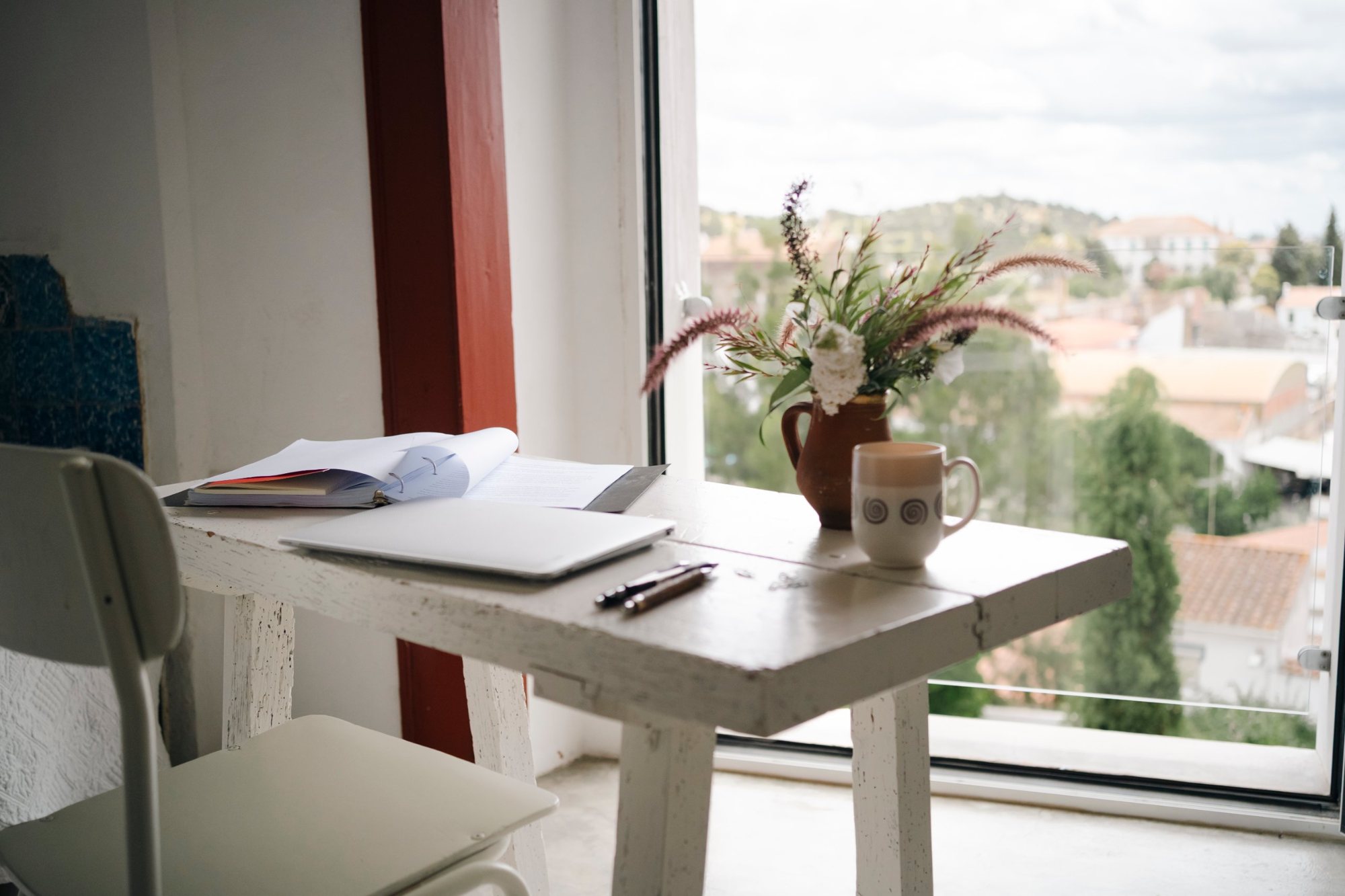 Writing desk by an open window